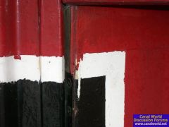 Bow door paintjob over rotting wood