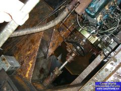 Engine bilge with rusty walter and oily water right to the t