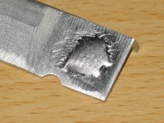 Aluminium tinned with solder.
