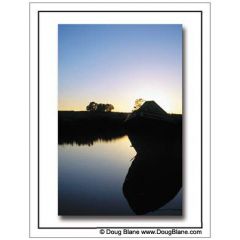 Silhouette of a trad moored near Bugbrooke at sunset