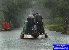 Summer rain 2008 - day boat crew brave the weather on the Ma