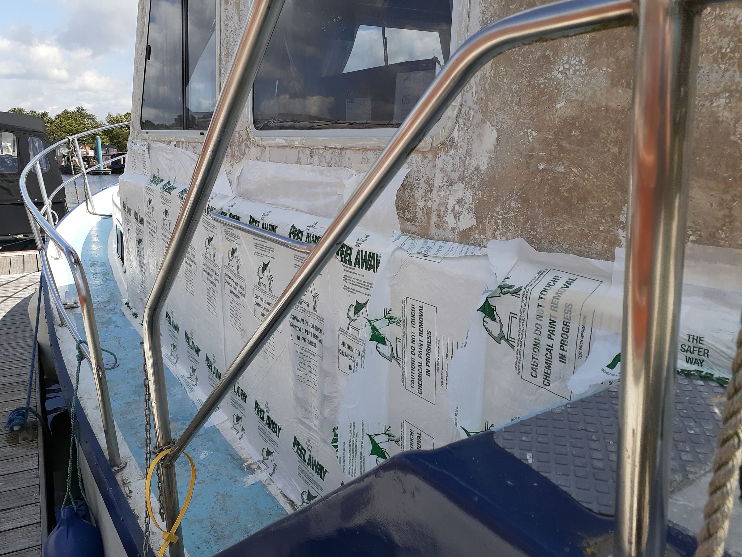 Stripping paint from grp boat and polishing help please? Boat