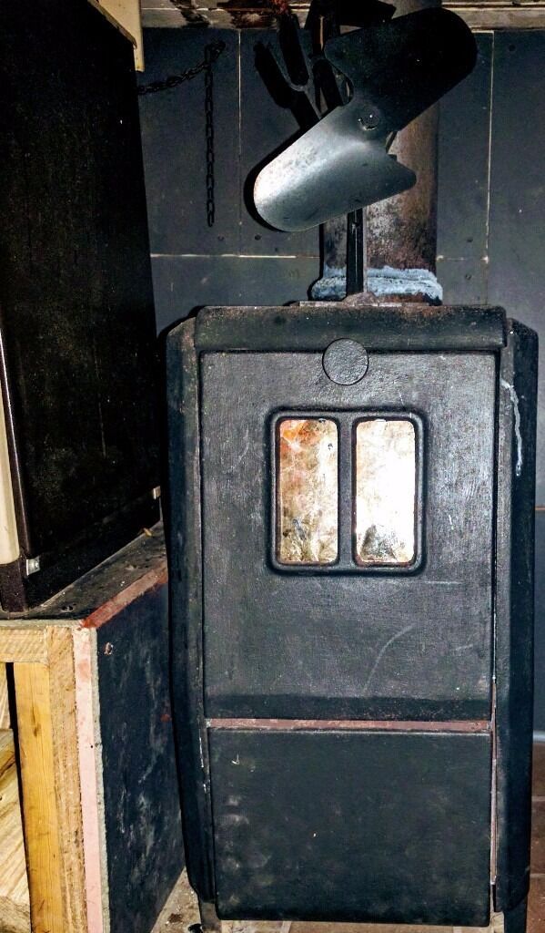 What makes of old white (ceramic?) Back cabin stove were there